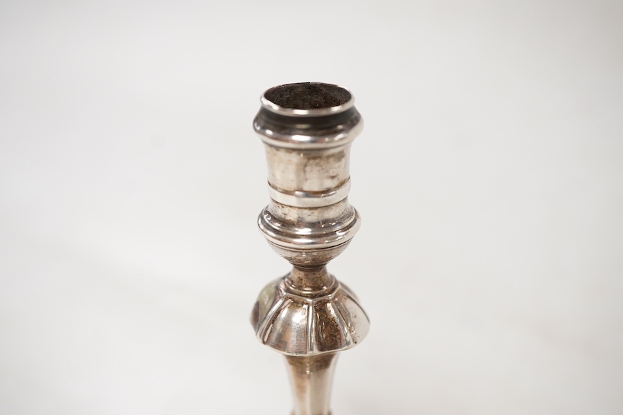 A George II silver taperstick, maker probably Richard Gosling, London, 1738, 99mm, engraved 'I. Alexander' to the base.